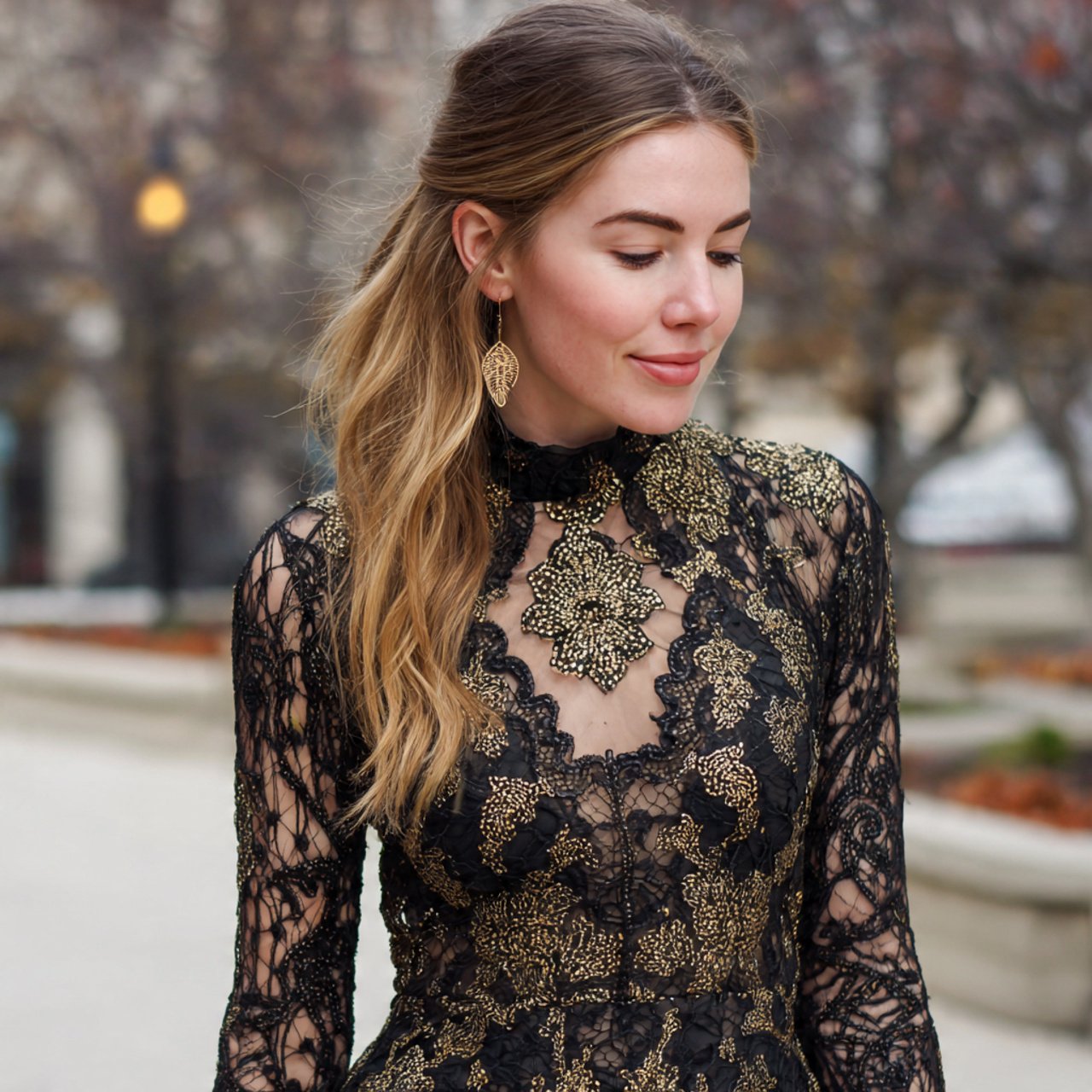 black lace midi dress with gold accents with cozy