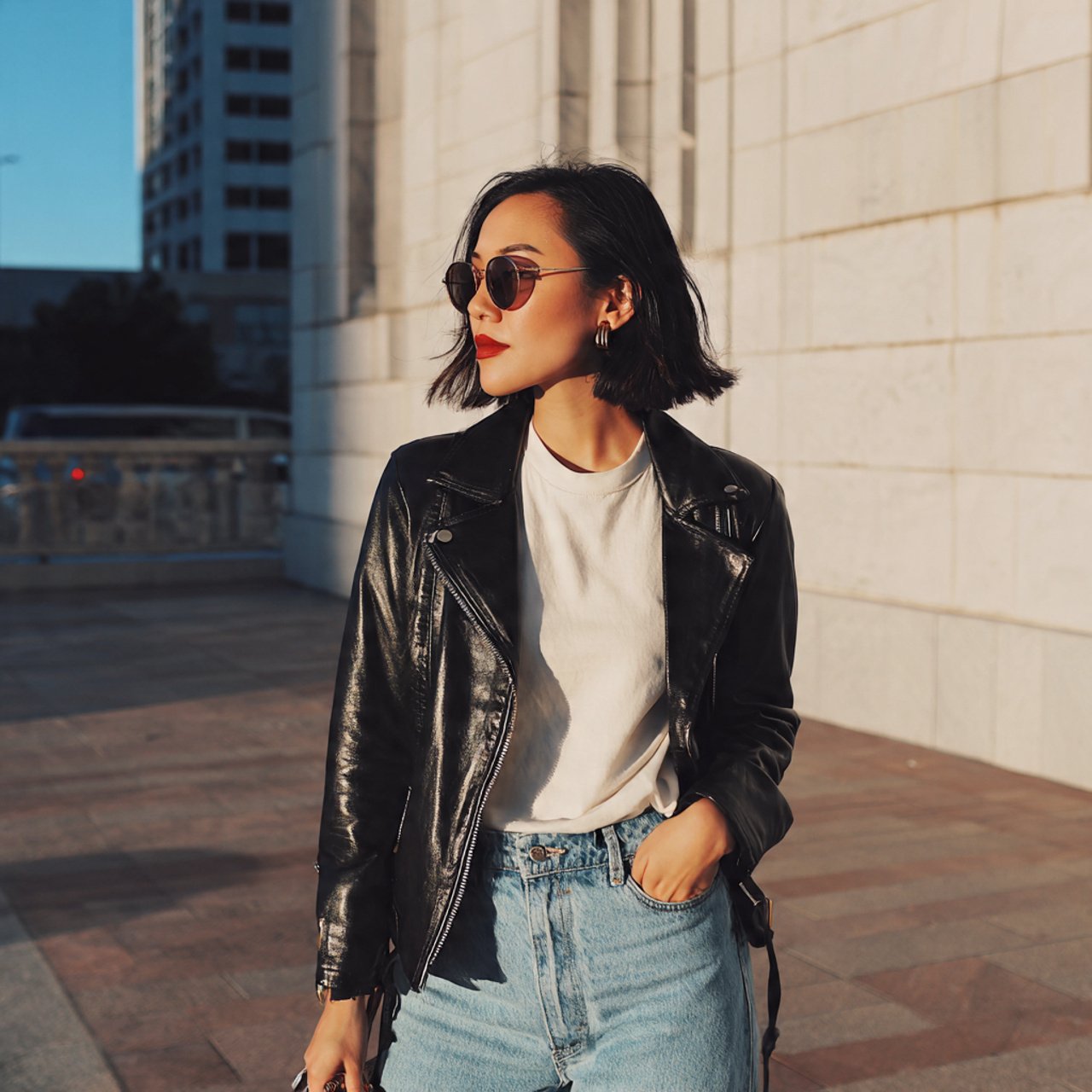 faux leather jacket basic tee mom jeans