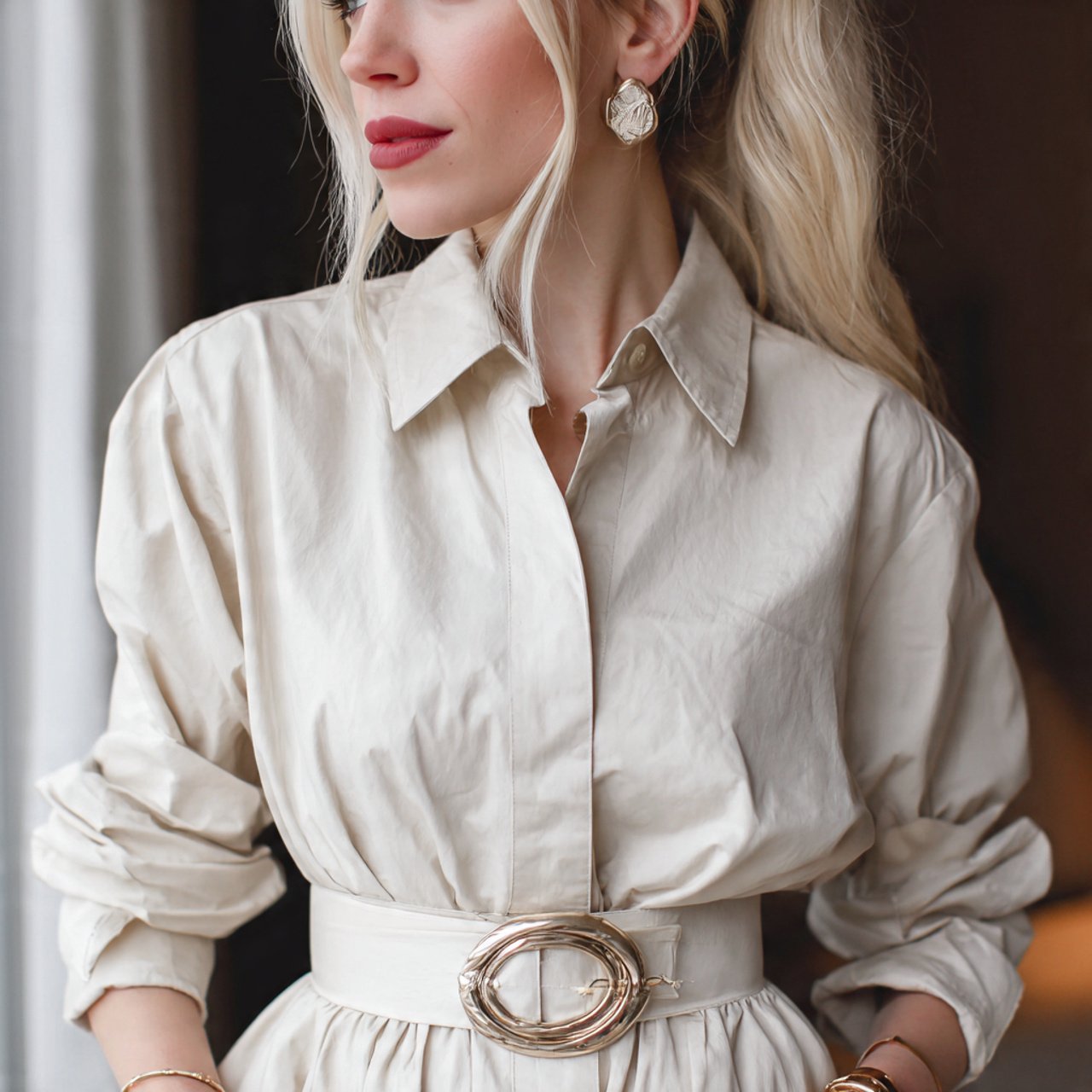 belted shirt dress with sculptural jewelrydate nig