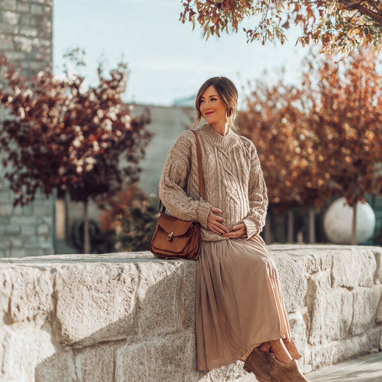 Pregnancy Outfits Winter: 16 Stylish and Practical Looks for Cold-Weather Comfort 13 cable knit sweater with flowing midi skirtpregnanc