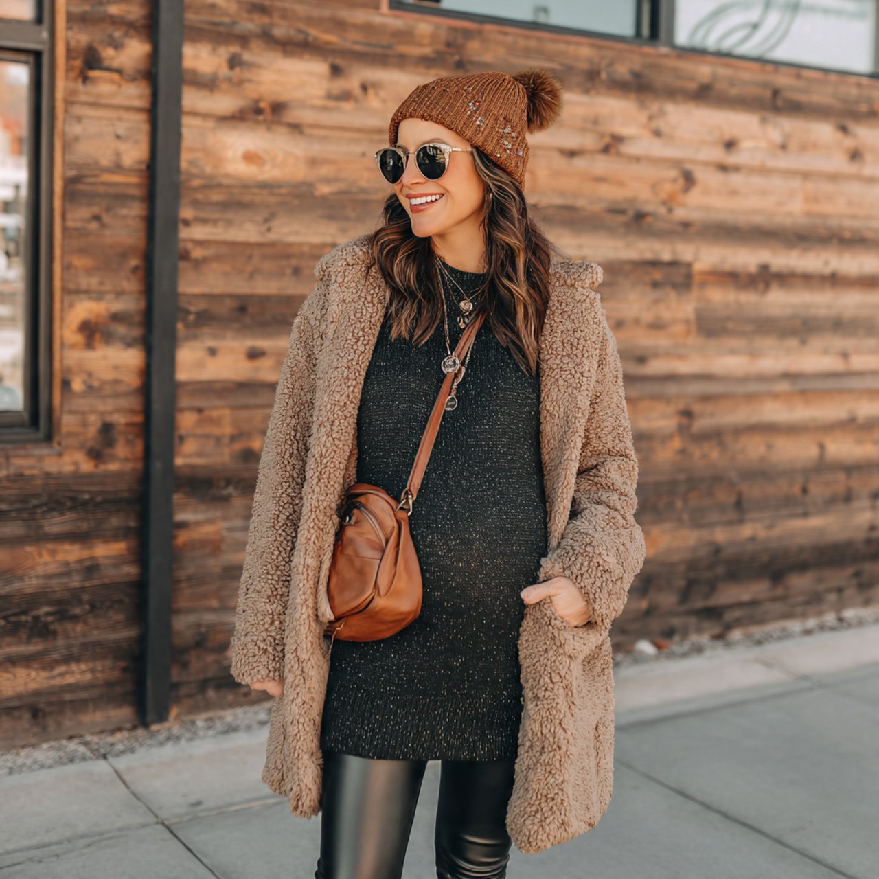 Pregnancy Outfits Winter: 16 Stylish and Practical Looks for Cold-Weather Comfort 8 faux leather leggings with tunic knit and teddy co