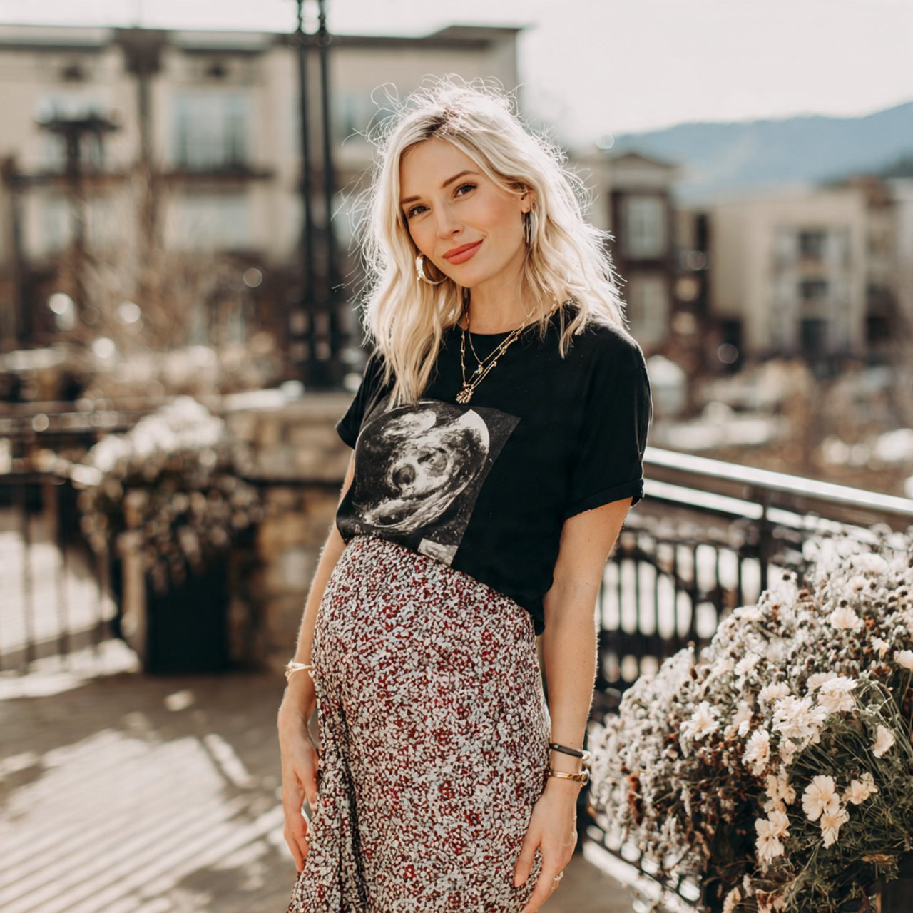 Cute Pregnancy Outfits: 17 Stylish Looks That Feel Comfortable, Flattering, and Easy to Wear 12 graphic tee with flowing slip skirtcute pregnancy