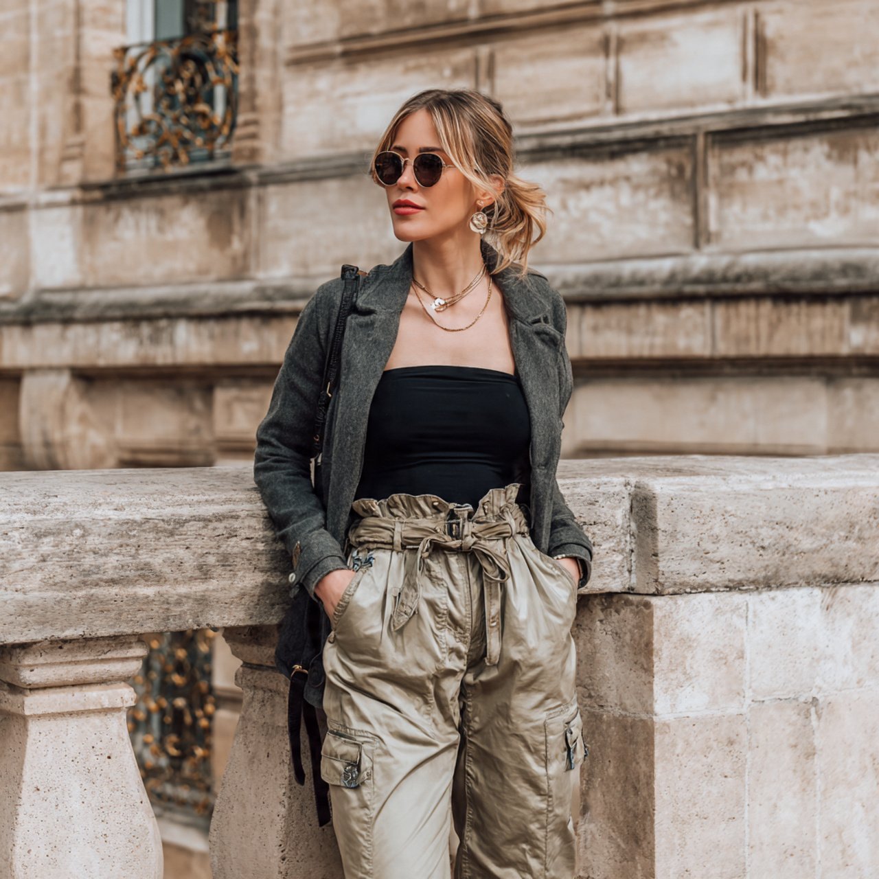 cargo pants with a sleek bodysuit and jacketmovie