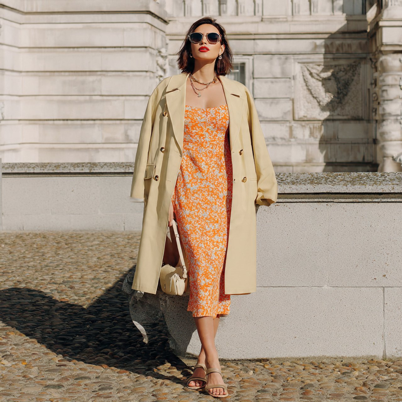 printed midi dress with minimal sandals and tailor