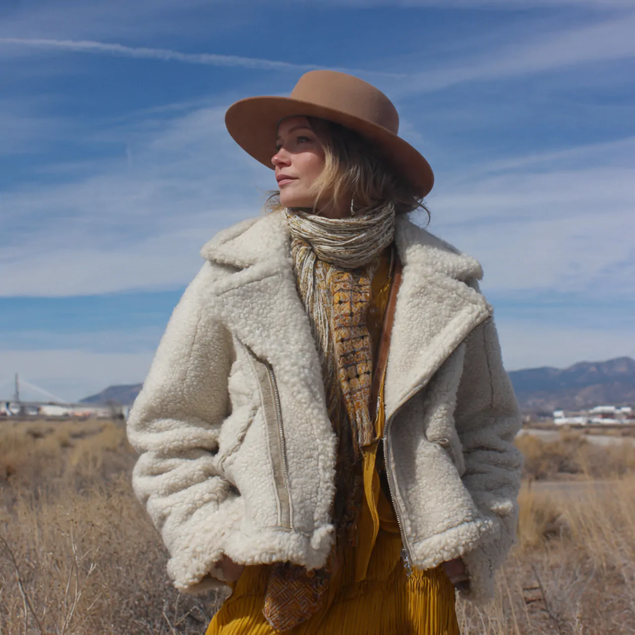 17 Stunning and Comfy Winter Outfits for Maximum Comfort and Style 12 shearling jacket wide brimmed hat