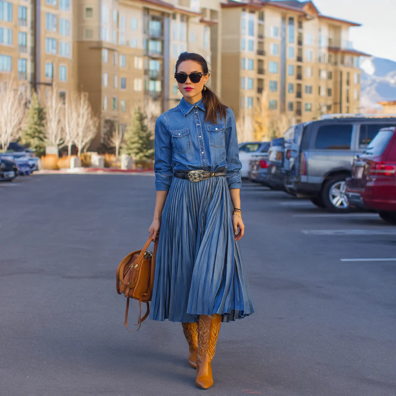17 Thanksgiving Outfit Looks for Chic, Comfortable Holiday Style 10 denim shirt with pleated midi skirtthanksgiving ou